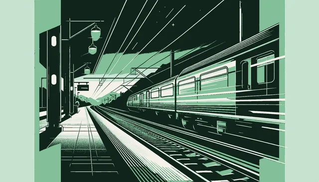 A fast-moving train leaving a station platform with the platform fading into darkness and green light along the track